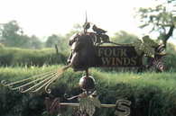Blowinig Man Weathervane with Gilt Grape Leaf  Detail